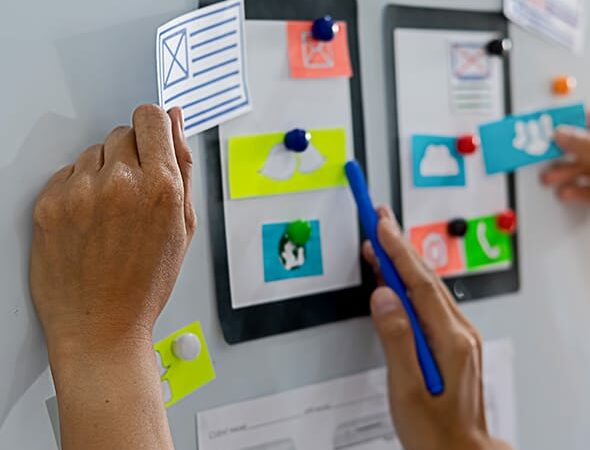 creative web designer planning application and developing template layout